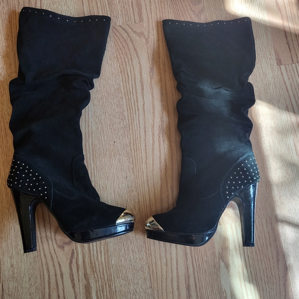 Black boots with gold accents
